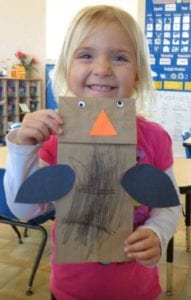 preschool girl with paper bag jaybird